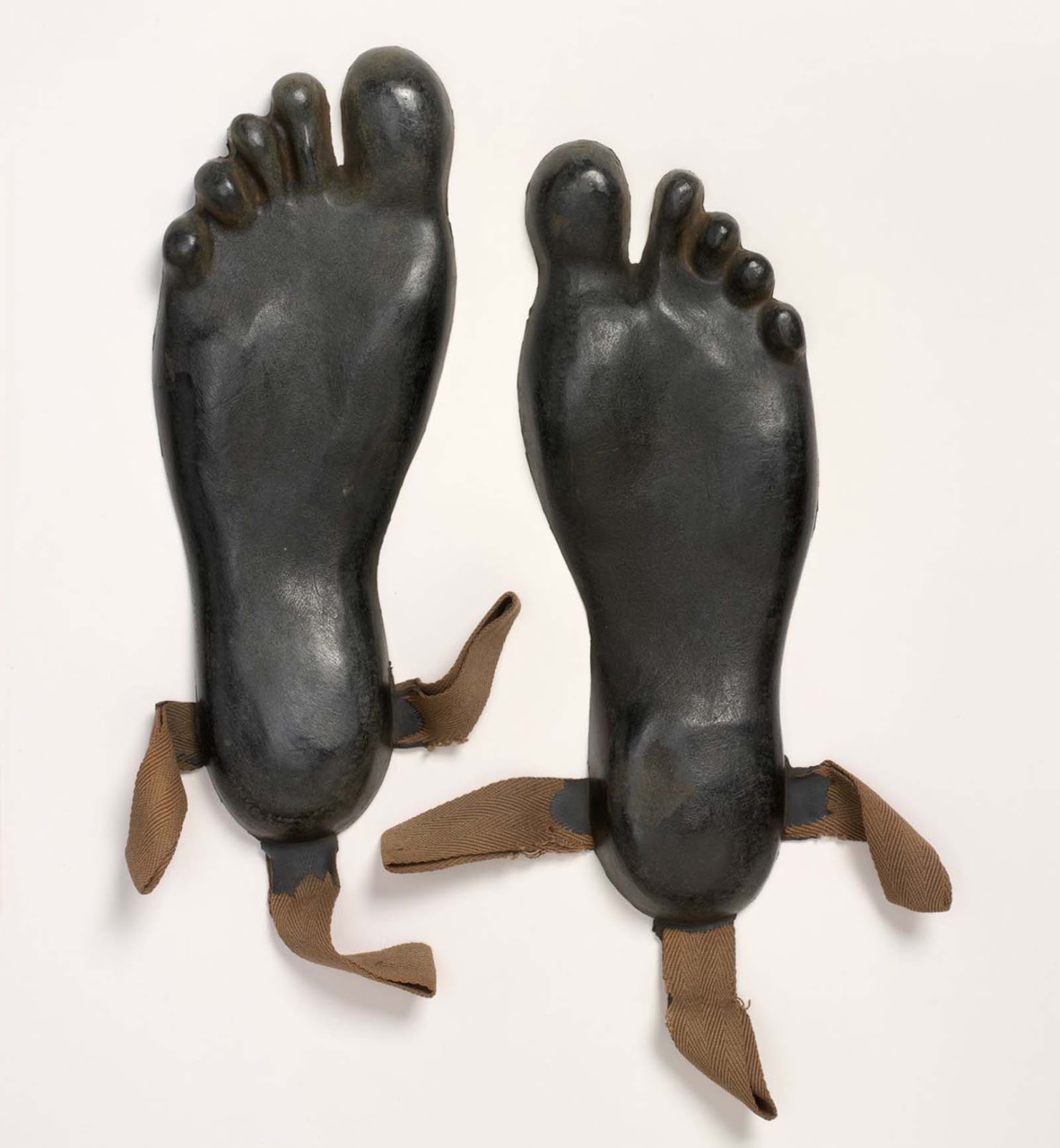 These overshoes were made for Britain's Special Operations Executive (SOE) agents operating in Asia and the Pacific. When the agent landed on a beach from the sea, the