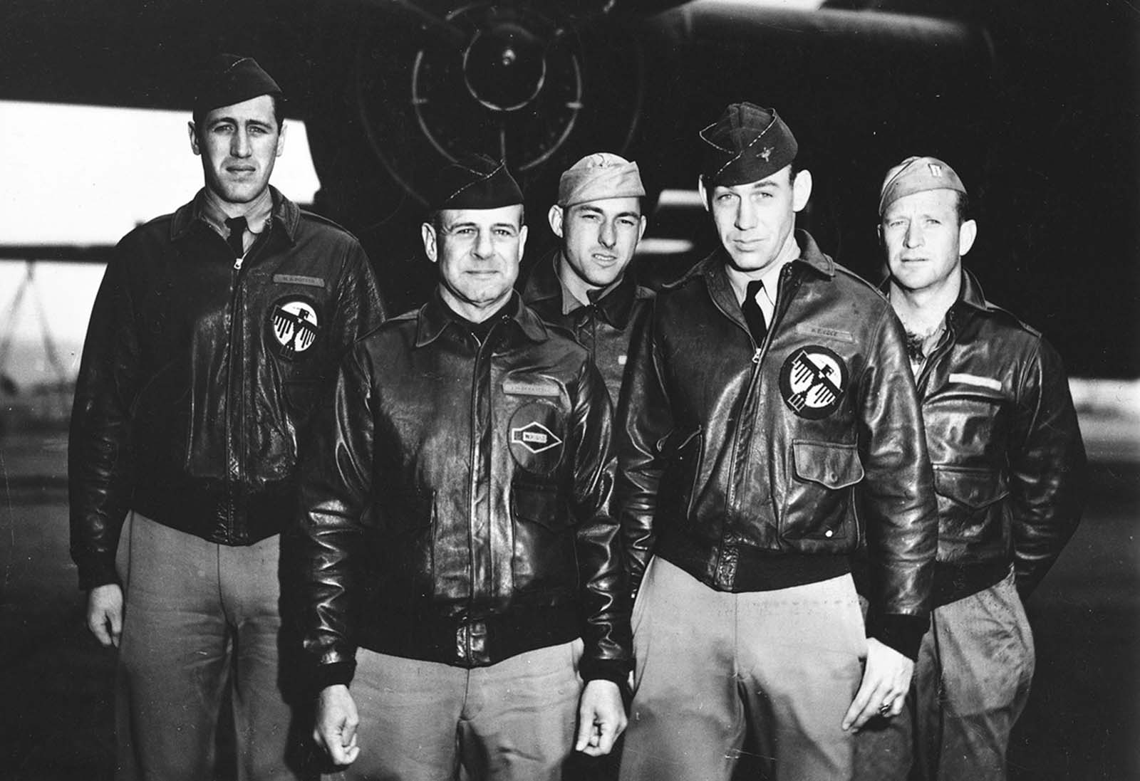 Posing in front of a bomber is Crew No. 1 of the Doolittle Raid, from the 34th Bombardment Squadron, Lt. Col. James H. Doolittle, pilot (2nd from left); Lt. Richard E. Cole, co-pilot; Lt. Henry A. Potter, navigator; SSgt. Fred A. Braemer, bombardier; SSgt. Paul J. Leonard, flight engineer/gunner.