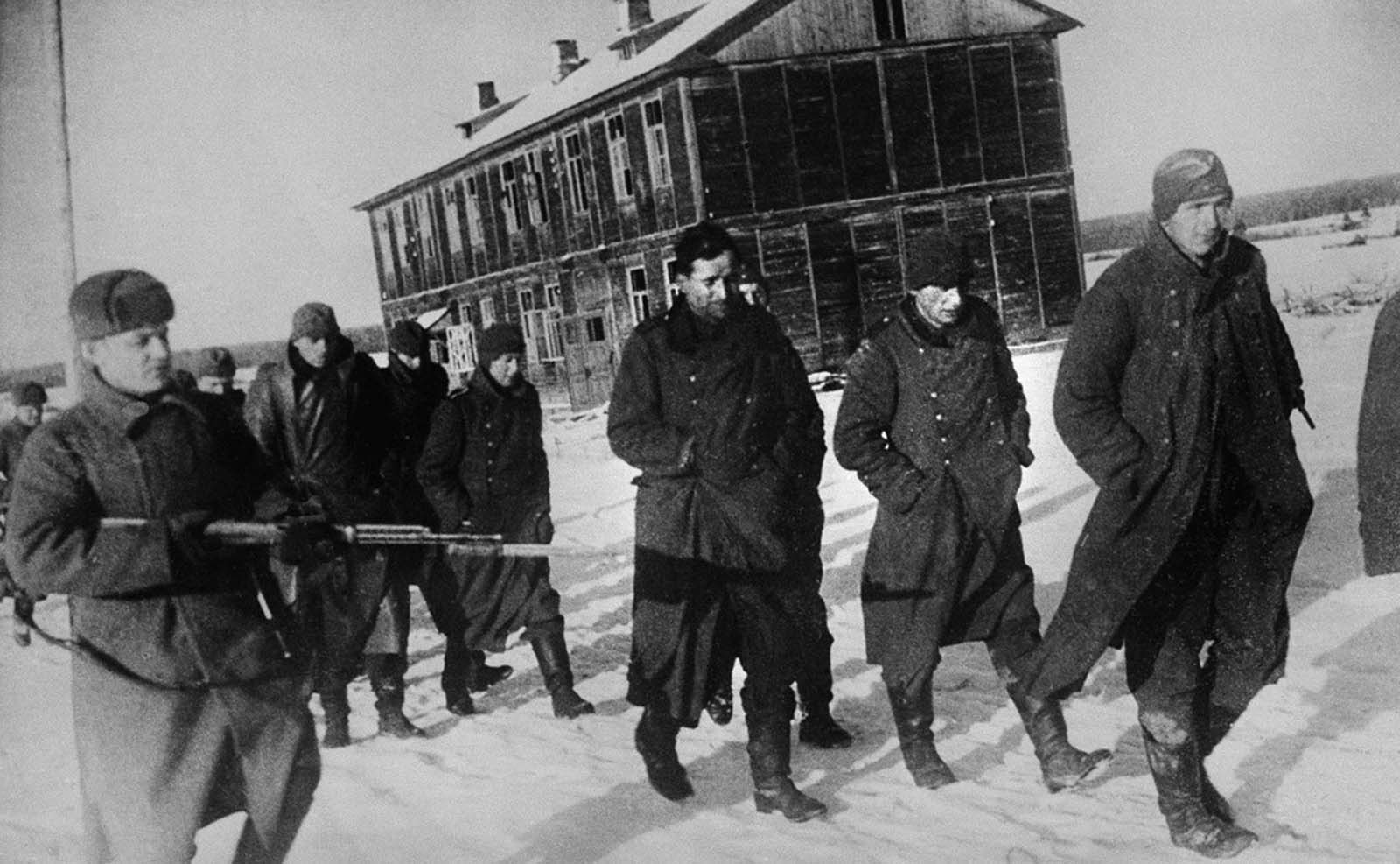Russian troops approach Moscow with German prisoners on February 10, 1942.