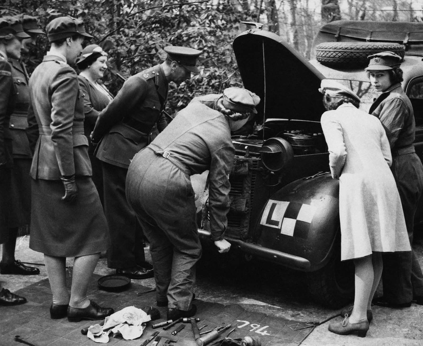 King George VI, Queen Elizabeth and Princess Margaret visit Princess Elizabeth.