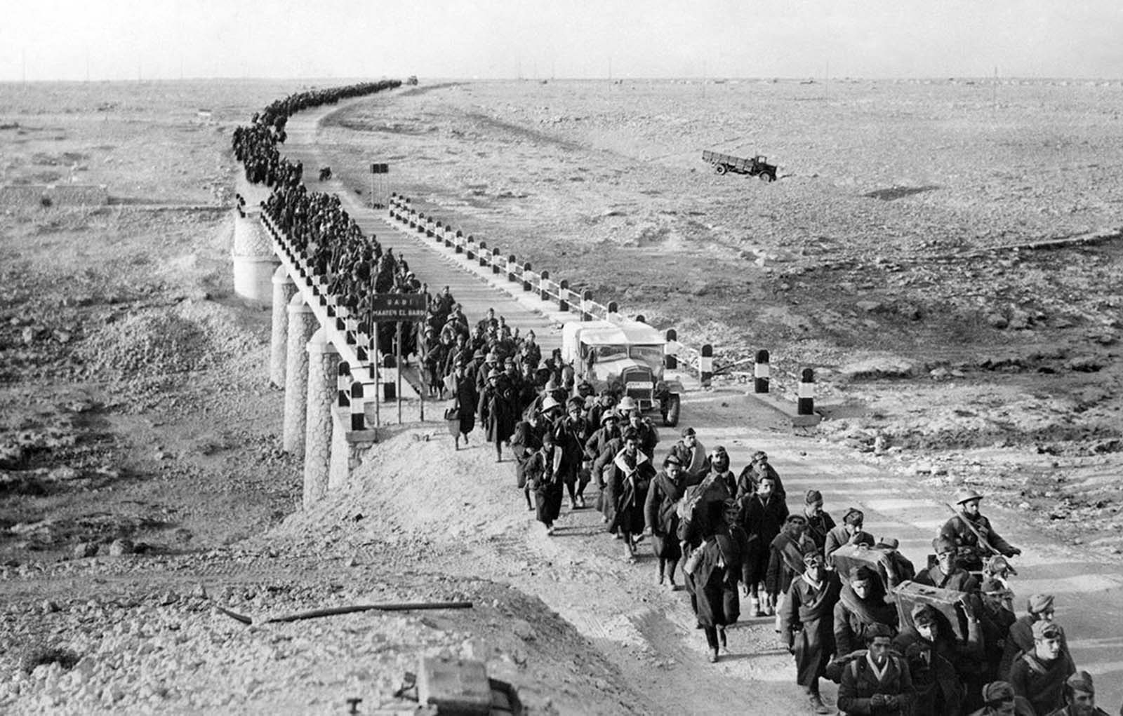 Bardia, a fortified Libyan seaport, was captured by British forces, with more than 38,000 Italian prisoners, including four generals, and vast quantities of war material. An endless stream of Italian prisoners leaves Bardia, on February 5, 1941, after the Australians had taken possession.