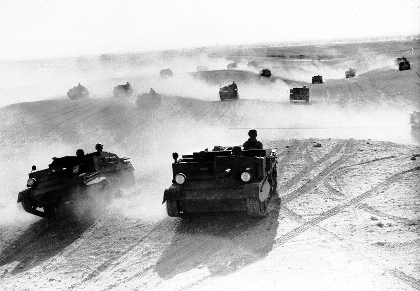 A squadron of Bren gun carriers, manned by the Australian Light Cavalry, rolls through the Egyptian desert in January of 1941. The troops performed maneuvers in preparation for the Allied campaign in North Africa.
