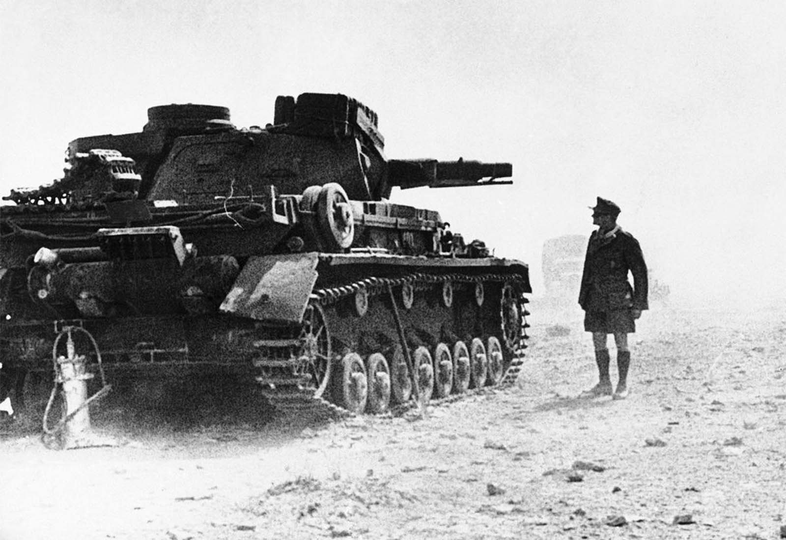 A huge Panzer IV German tank, part of the German expeditionary force in North Africa, halts in the Libyan Desert on April 14, 1941.