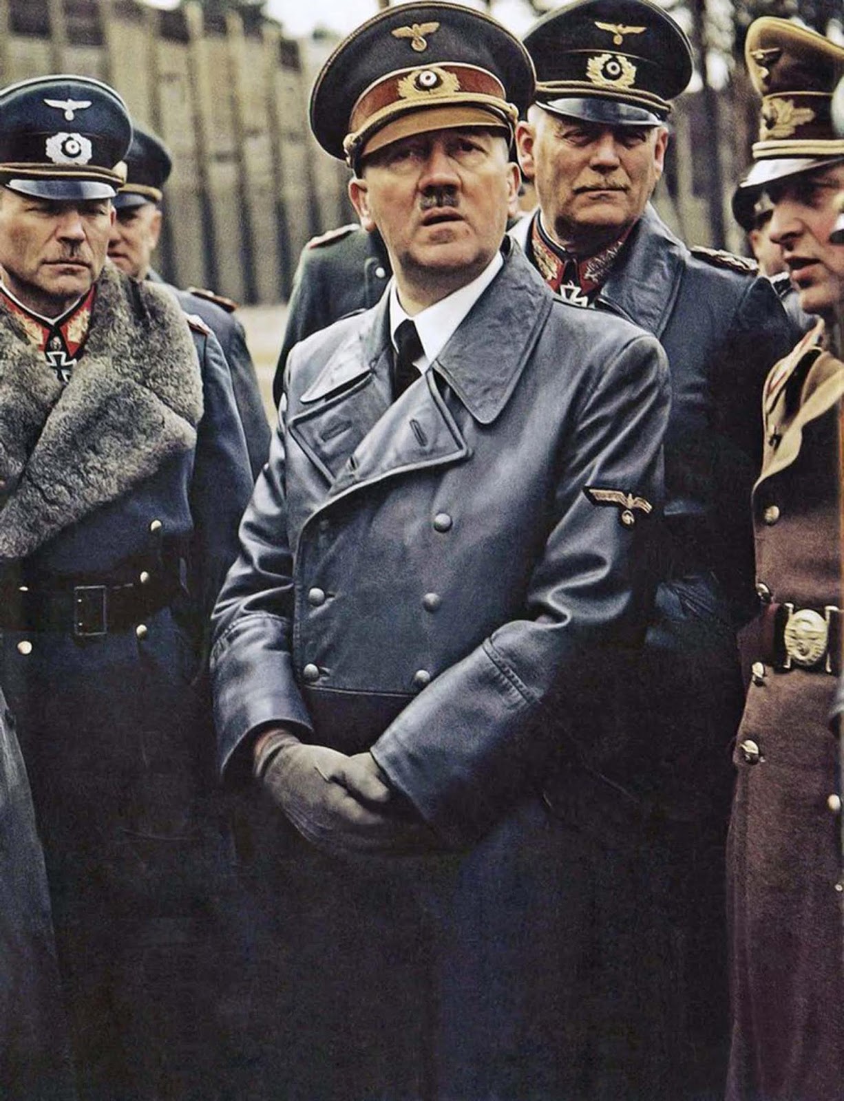 I know the center of attention here is Hitler - which is how he liked it (and probably why he dated a photographer, by the way). But the one who stands out in this shot is Heinz Guderian on the left. You have got to be a real badass to get away with that pimp collar in the middle of a bunch of killers.