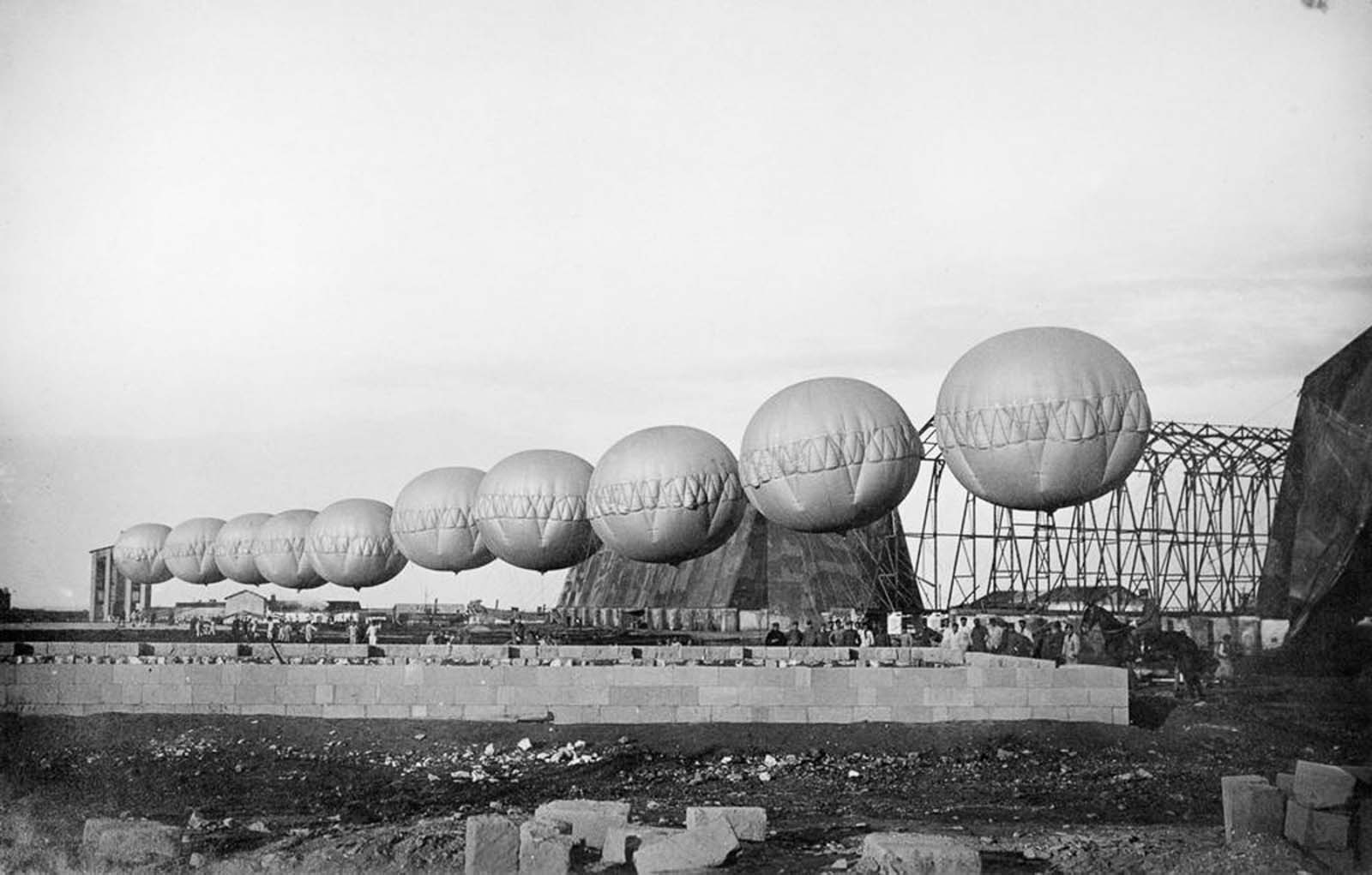 A row of barrage balloons used for suspending aerial nets in Brindisi, Italy. 1918.