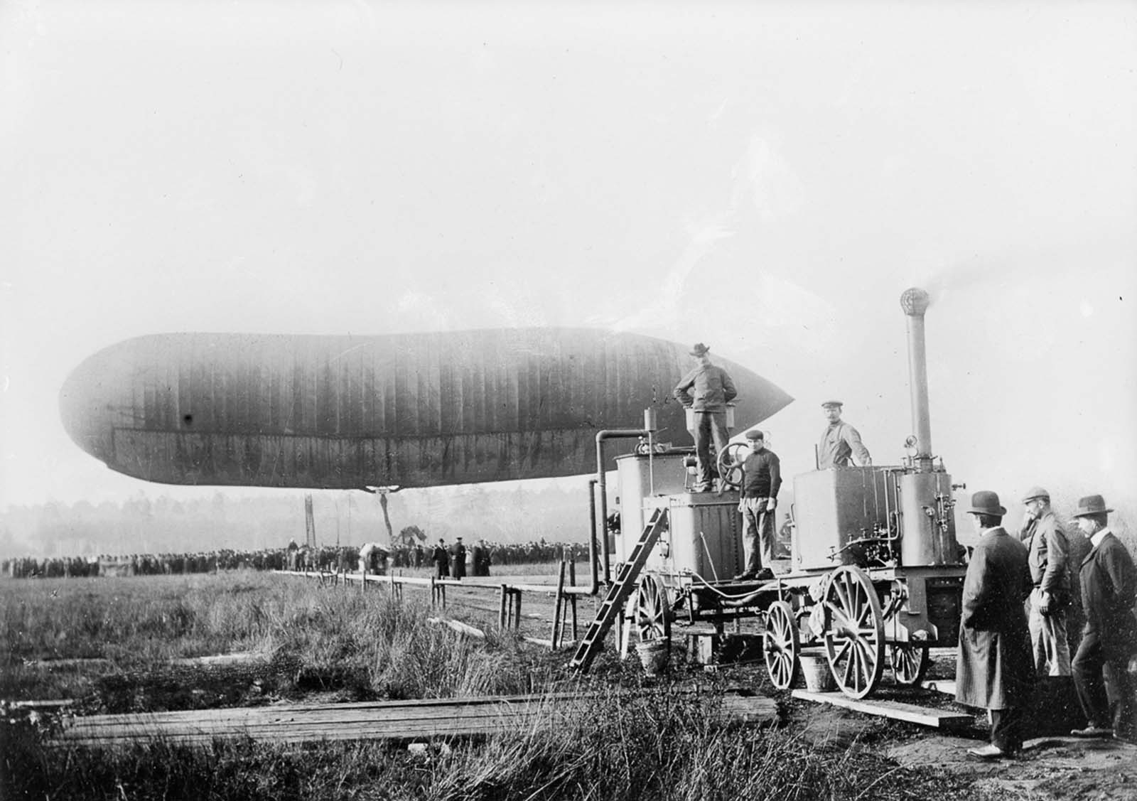 Hydrogen is pumped into an observation balloon to inflate it. 1914.