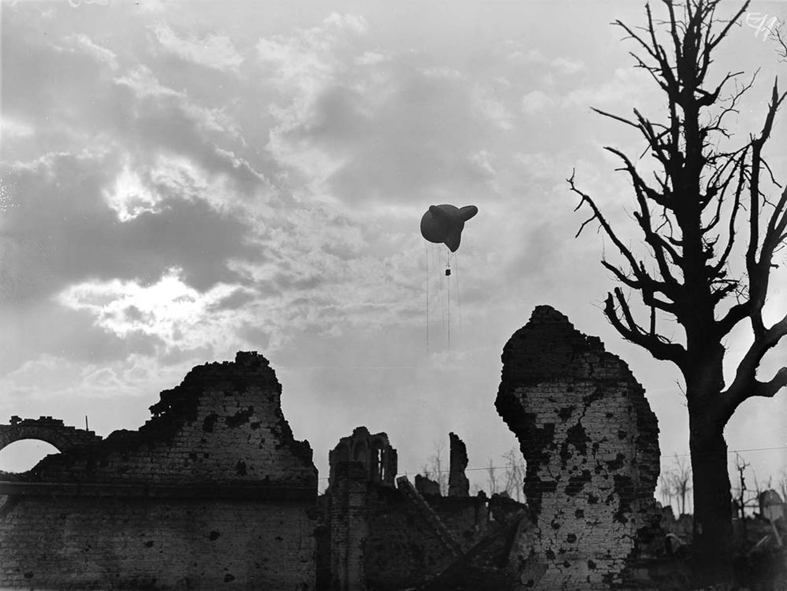 An observation balloon above the ruins of Ypres, Belgium. 1917.