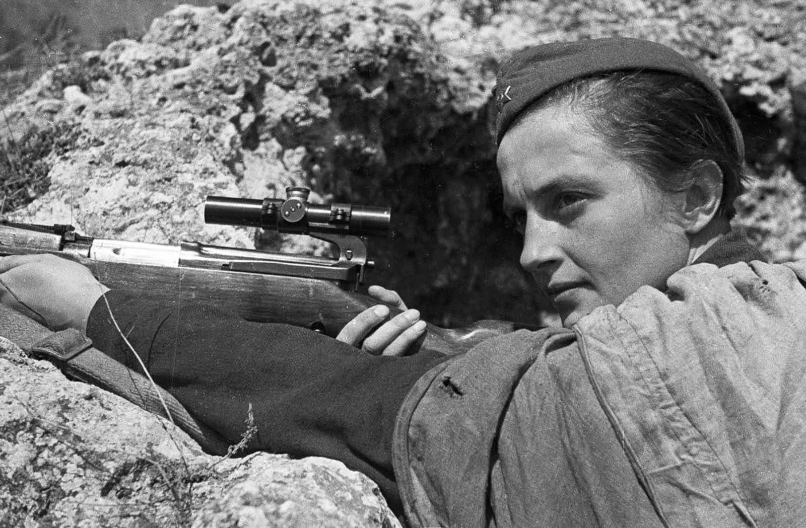 Lyudmila Pavlichenko in combat at Sevastopol. With 309 confirmed kills, she is one the deadliest snipers in history. June, 1942.
