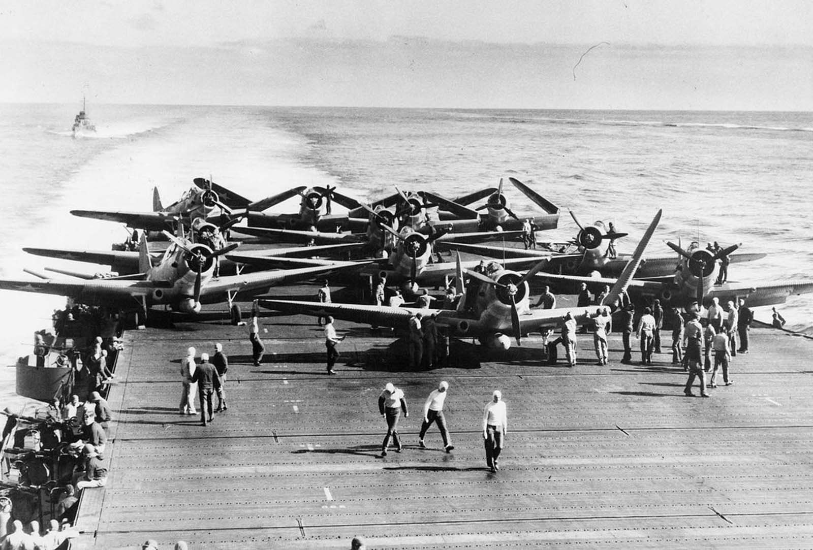 TBD-1 torpedo bombers of Torpedo Squadron Six unfold their wings on the deck of USS Enterprise prior to launching an attack against four Japanese carriers on the first day of the Battle of Midway. Launched on the morning of June 4, 1942, against the Japanese carrier fleet during the Battle of Midway, the squadron lost ten of fourteen aircraft during their attack.