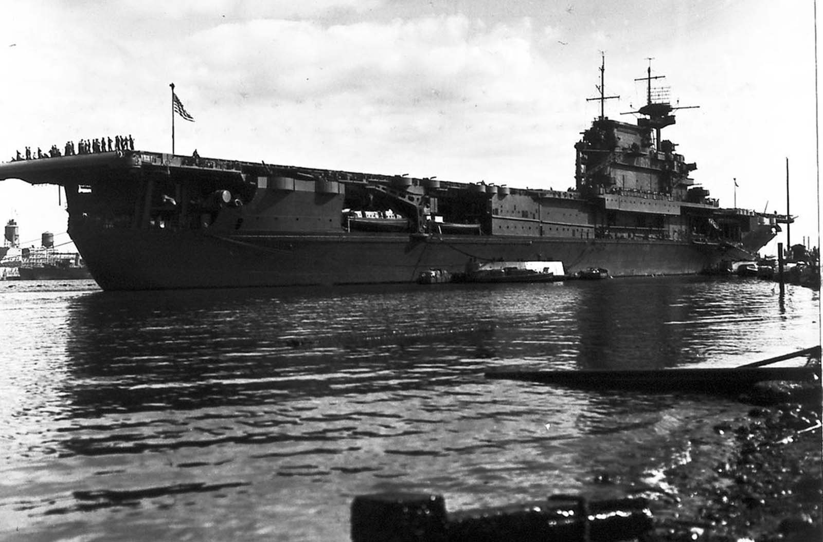 Aircraft carrier USS Enterprise at Ford Island in Pearl Harbor, Hawaii, in late May 1942, being readied for the Battle of Midway.