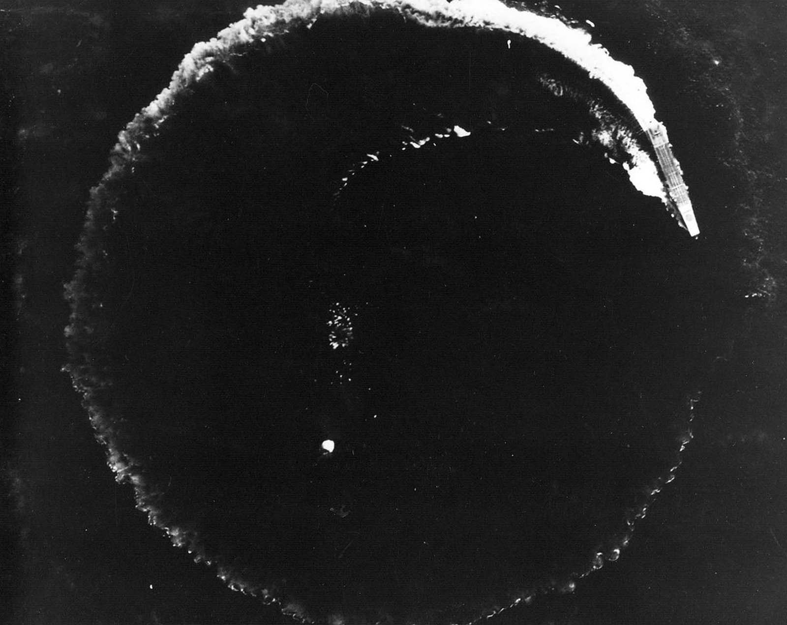 The Japanese aircraft carrier Soryu maneuvers to avoid bombs dropped by Army Air Forces B-17 Flying Fortresses during the Battle of Midway, on June 4, 1942.