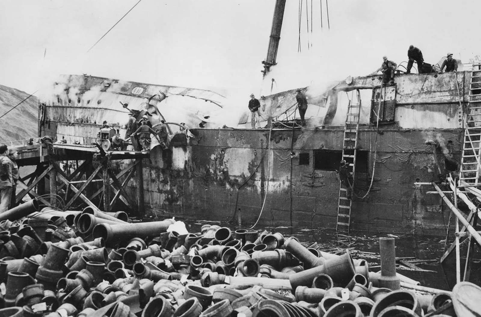 The ruins of a bombed ship at Dutch Harbor, Alaska, on June 5, 1942.