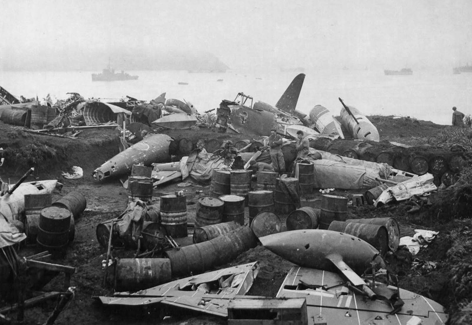 Wrecked Japanese planes, oil and gas drums are a mass of rubble on Kiska, Aleutian Islands, on August 19, 1943, as a result of Allied bombings.