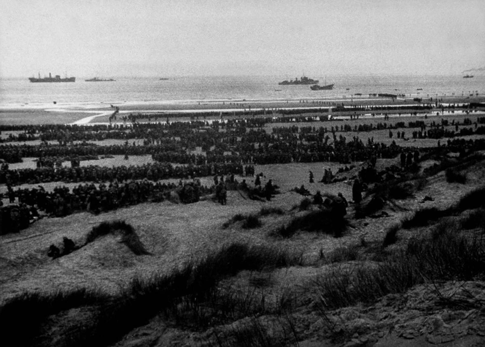 British Expeditionary Forces queue up on the beach at Dunkirk to await evacuation.