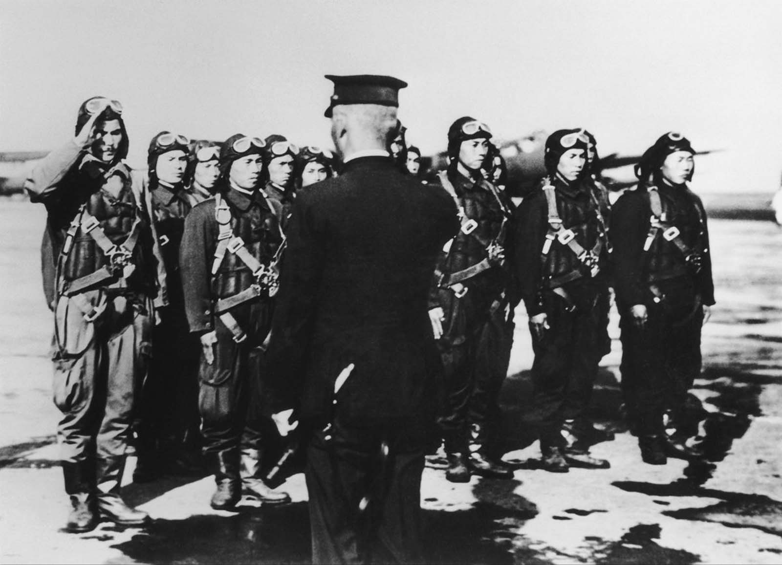 Pilots receive final orders before taking off.