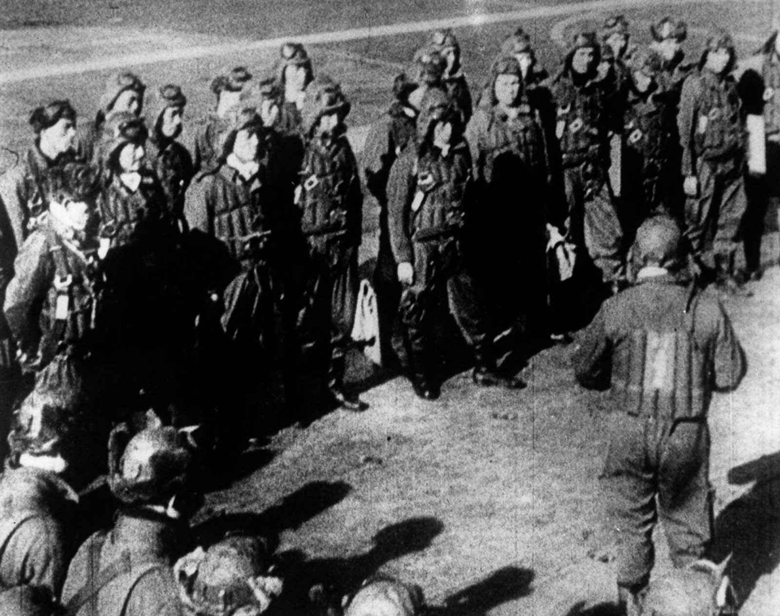 Pilots assemble to receive their final orders.