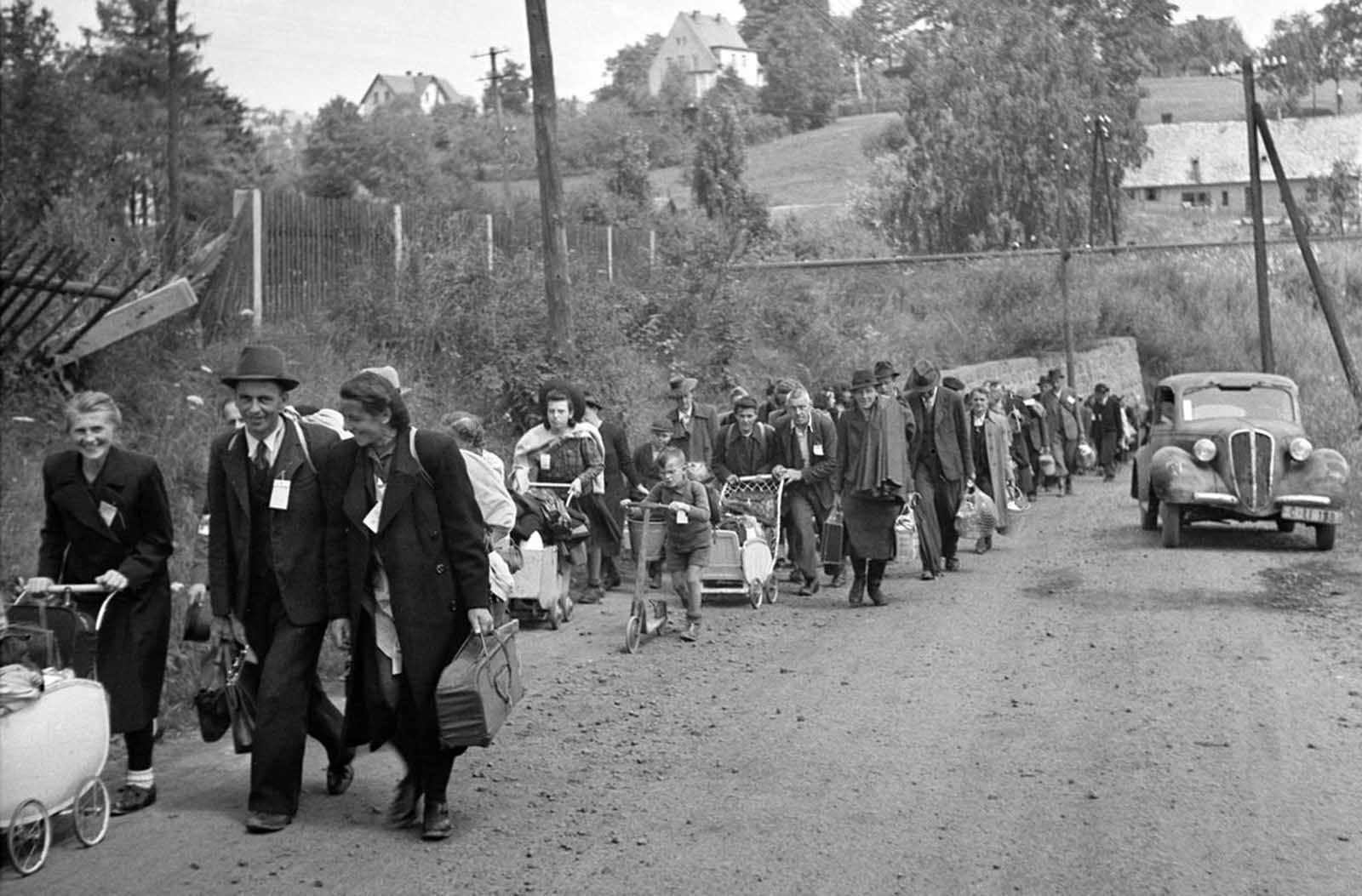 Sudeten Germans make their way to the railway station in Liberec, in former Czechoslovakia, to be transferred to Germany in this July, 1946 photo. After the end of the war, millions of German nationals and ethnic Germans were forcibly expelled from both territory Germany had annexed, and formerly German lands that were transferred to Poland and the Soviet Union. The estimated numbers of Germans involved ranges from 12 to 14 million, with a further estimate of between 500,000 and 2 million dying during the expulsion.