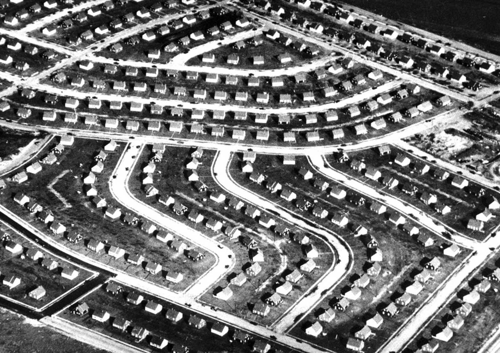 This aerial file photo shows a portion of Levittown, New York, in 1948 shortly after the mass-produced suburb was completed on Long Island farmland in New York. This prototypical suburban community was the first of many mass-produced housing developments that went up for soldiers coming home from World War II. It also became a symbol of postwar suburbia in the U.S.
