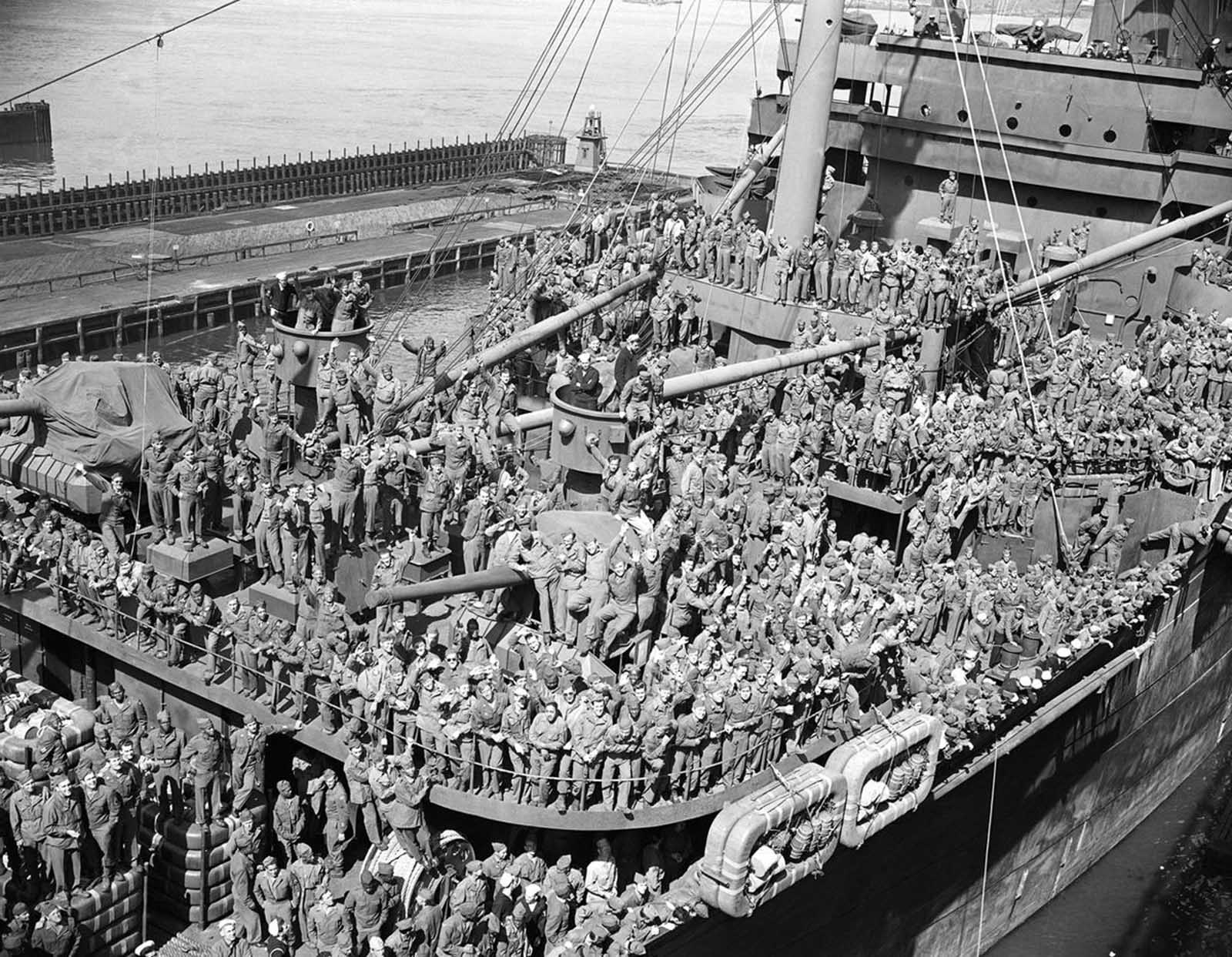 The super transport ship, General W.P. Richardson, docked in New York, with veterans of the European war cheering on June 7, 1945. Many soldiers were veterans of the African campaign, Salerno, Anzio, Cassino and the winter warfare in Italy's mountains.
