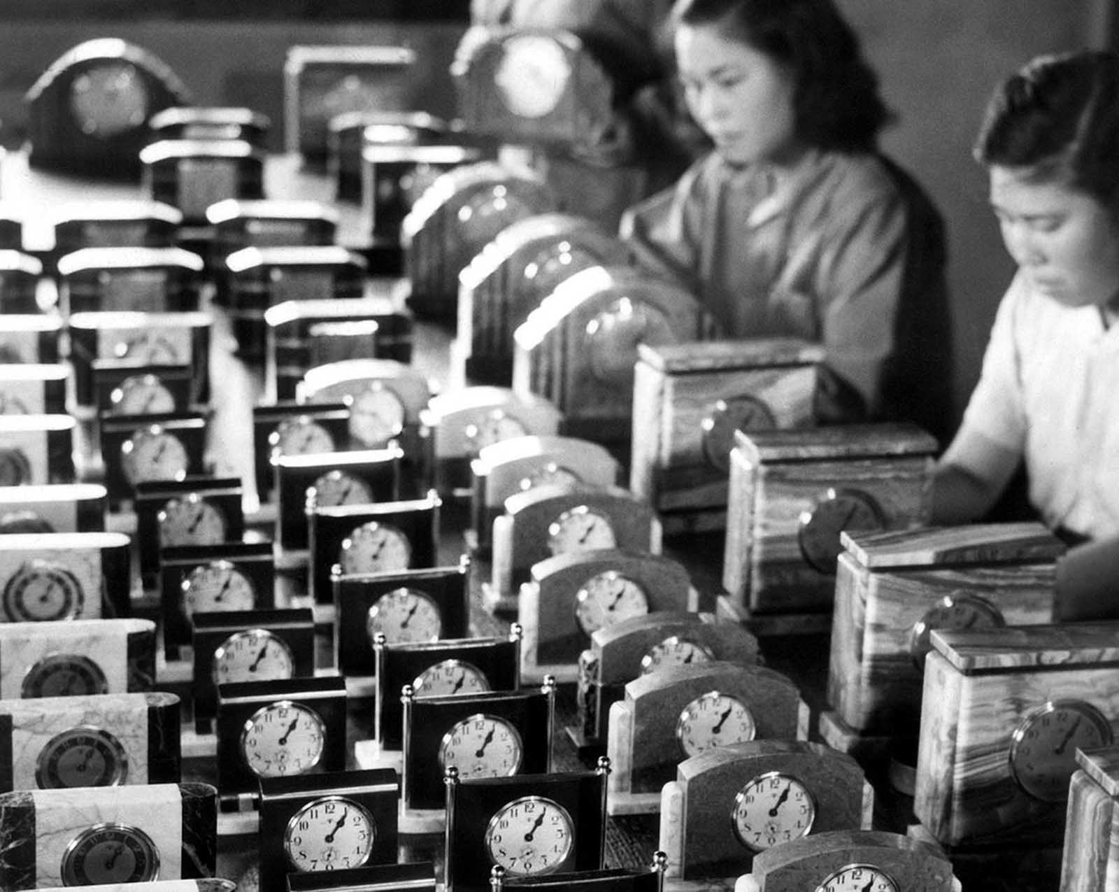 Clocks are being readied for export to Allied countries, shown as collateral for imported goods needed by Japan. Thirty-four Japanese factories produced 123,000 clocks during April of 1946. Photo taken on June 25, 1946.