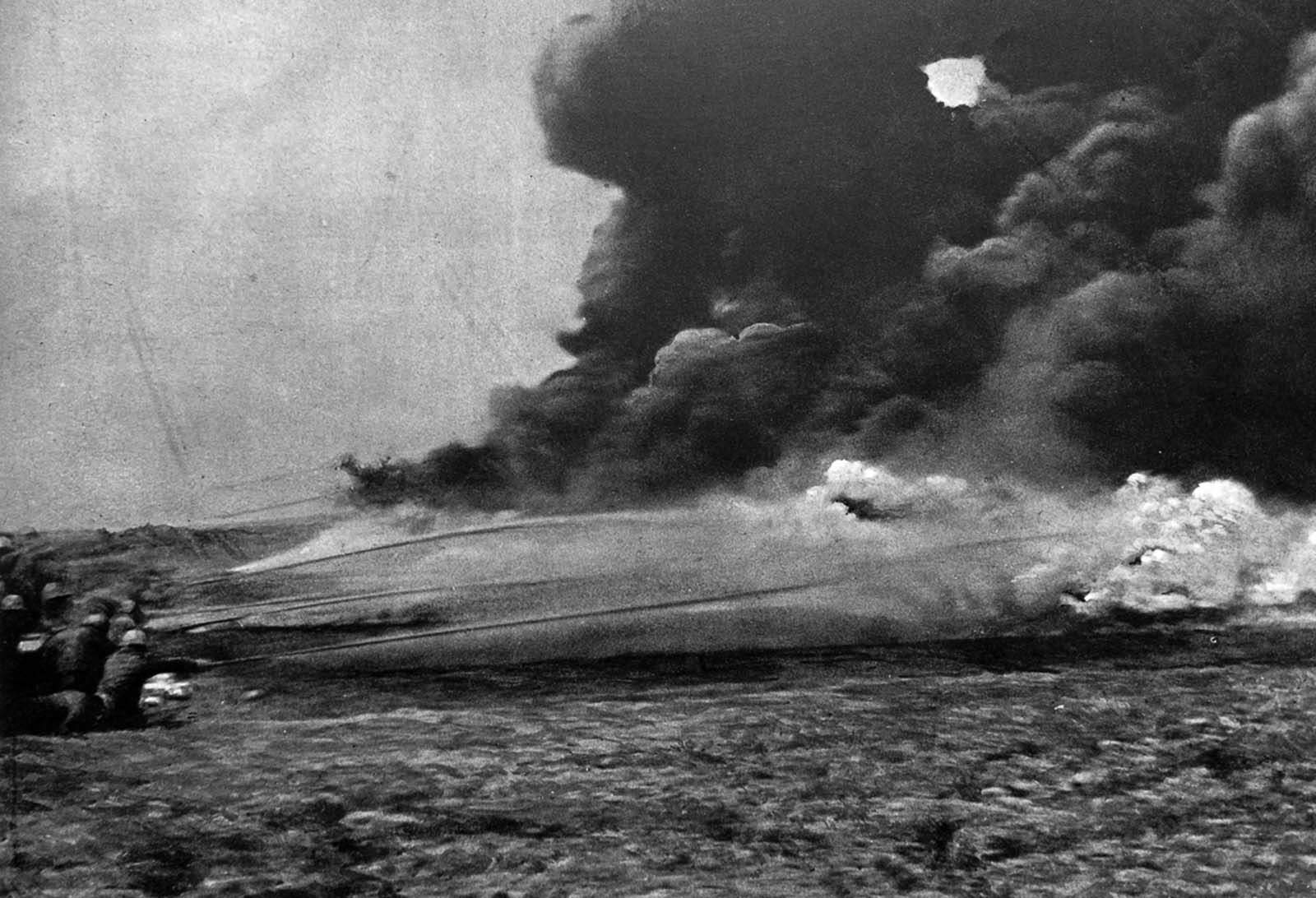 French flamethrowers attack a German trench. 1916.
