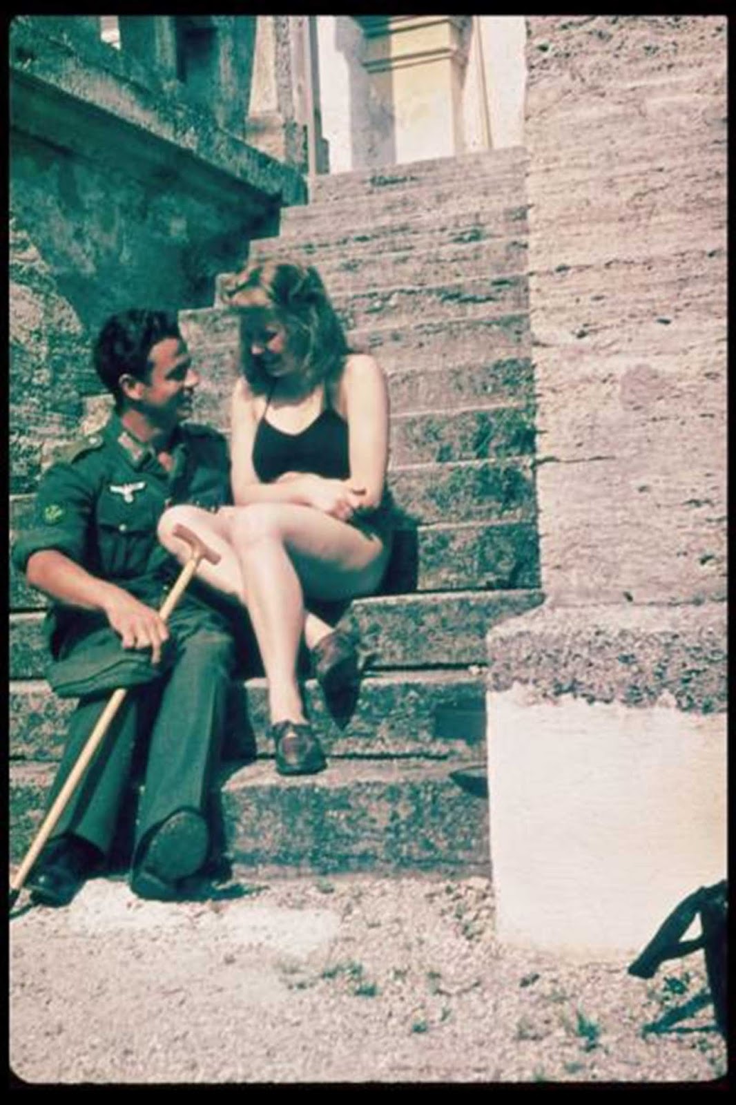 Rare color selfie of a Wehrmacht soldier and his girl. His cane suggests that he was recuperating from a war wound, rear area hospitals were one of the few times a soldier could relax and have a little fun.