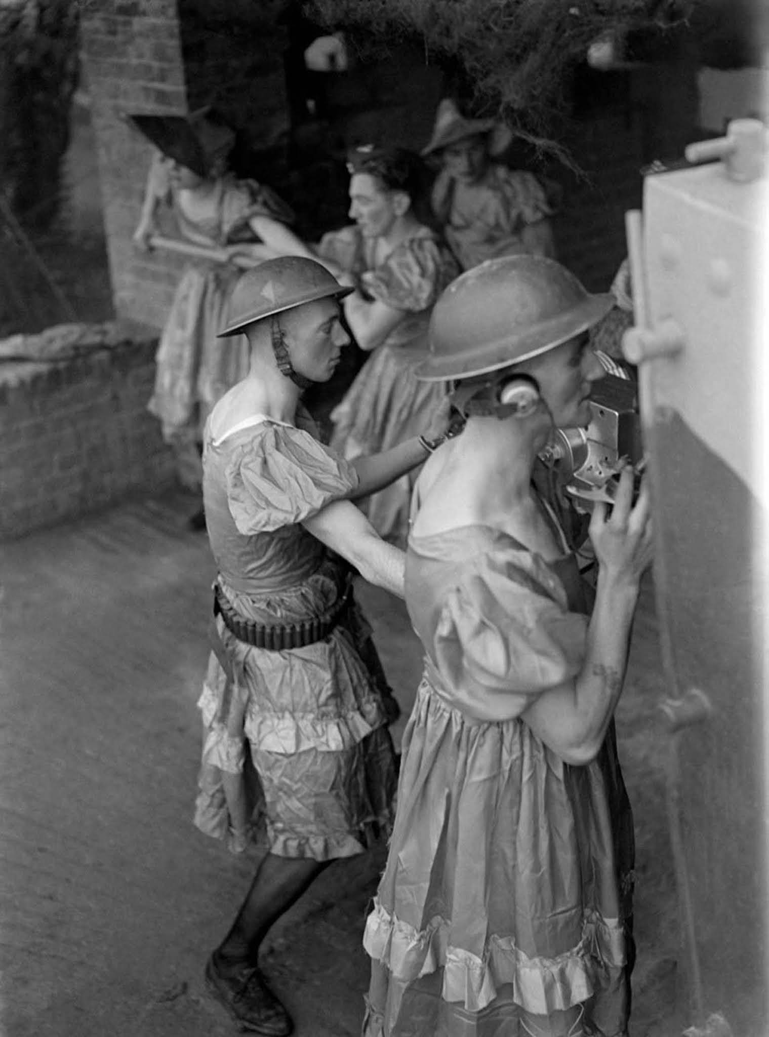 british soldiers manning anti aircraft guns in womens clothes