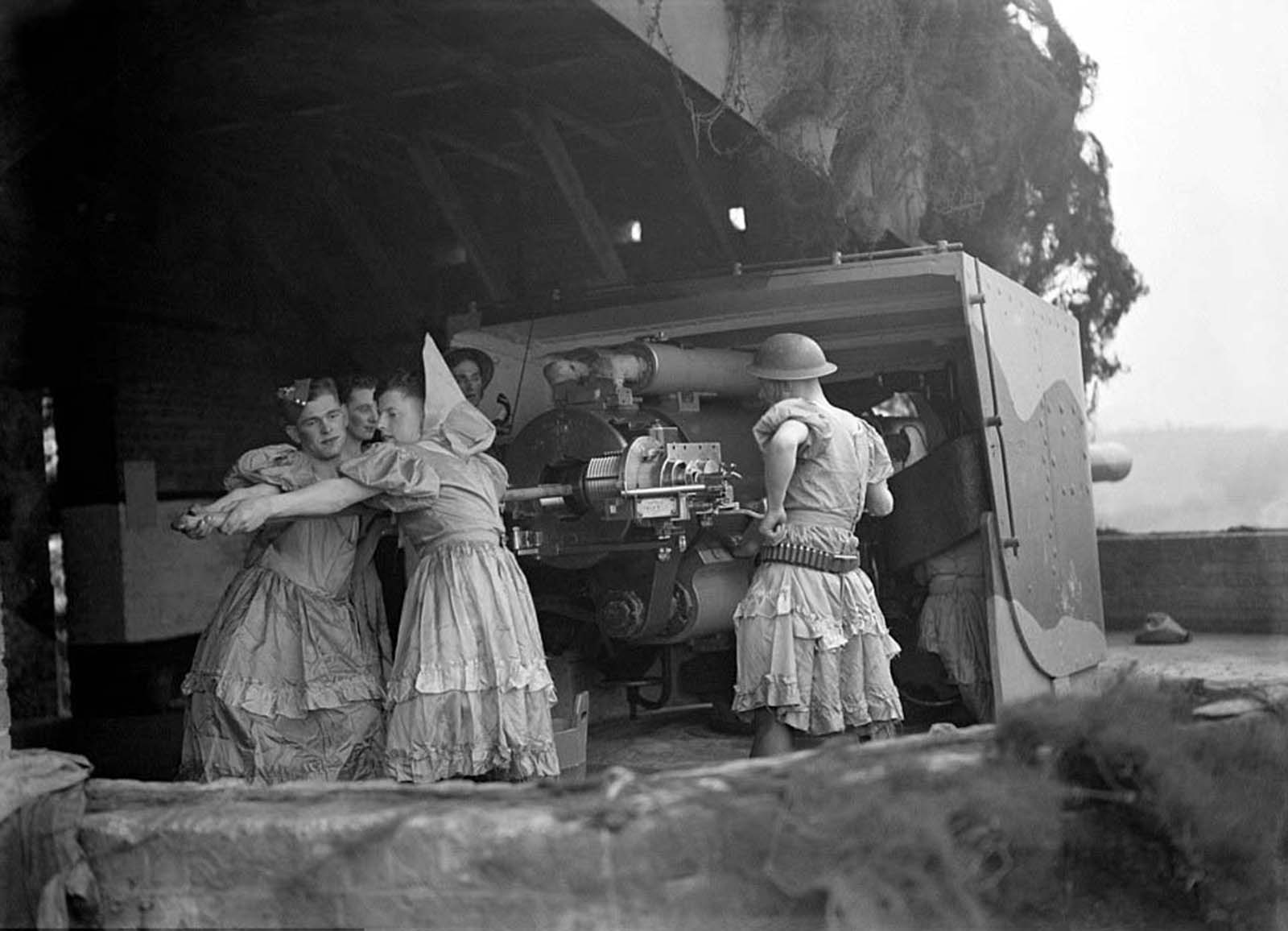 british soldiers manning anti aircraft guns in womens clothes