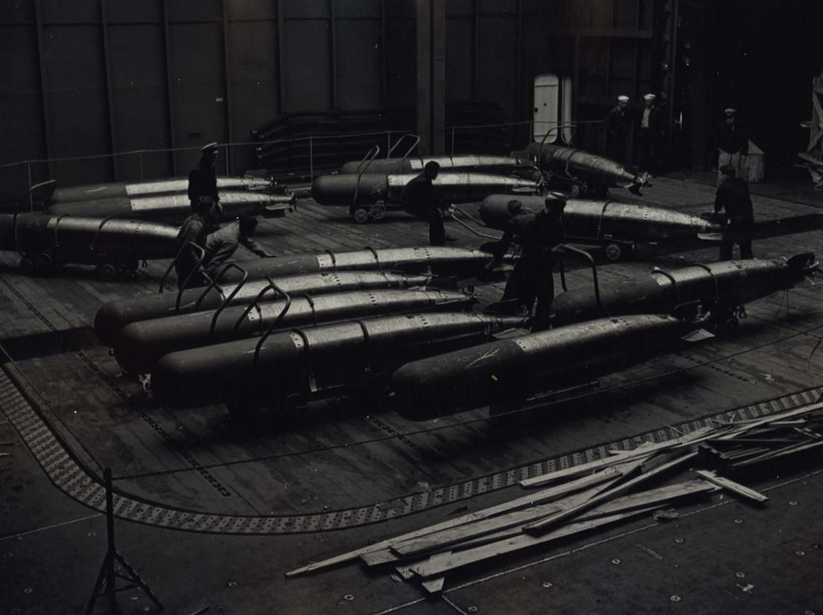 Crew with Naval Torpedoes, c. 1943.