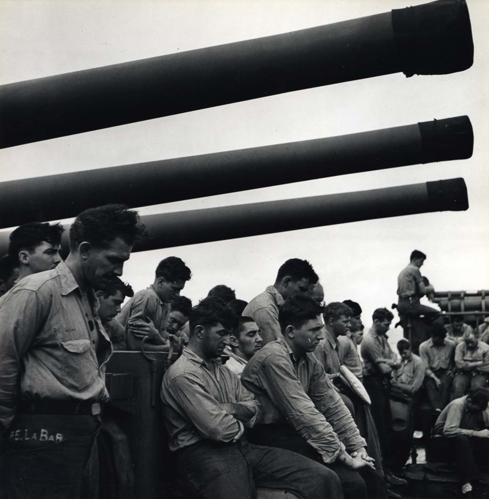 Sailors Aboard U.S.S. Yorktown with Naval Artillery Above, c. 1943.