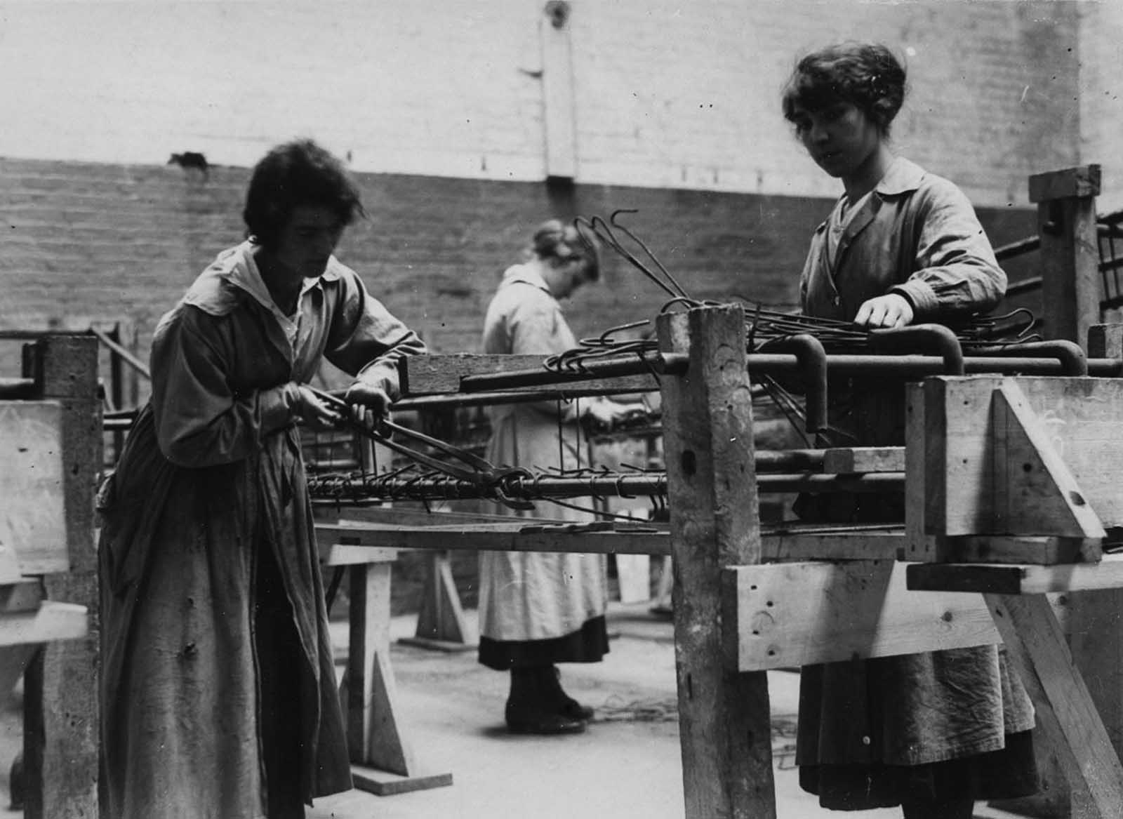 Workers prepare for the construction of concrete ships.