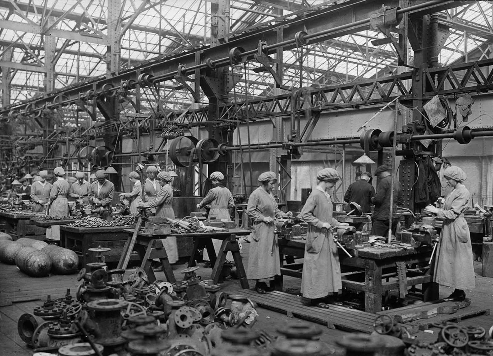 Workers in a brass fittings shop.