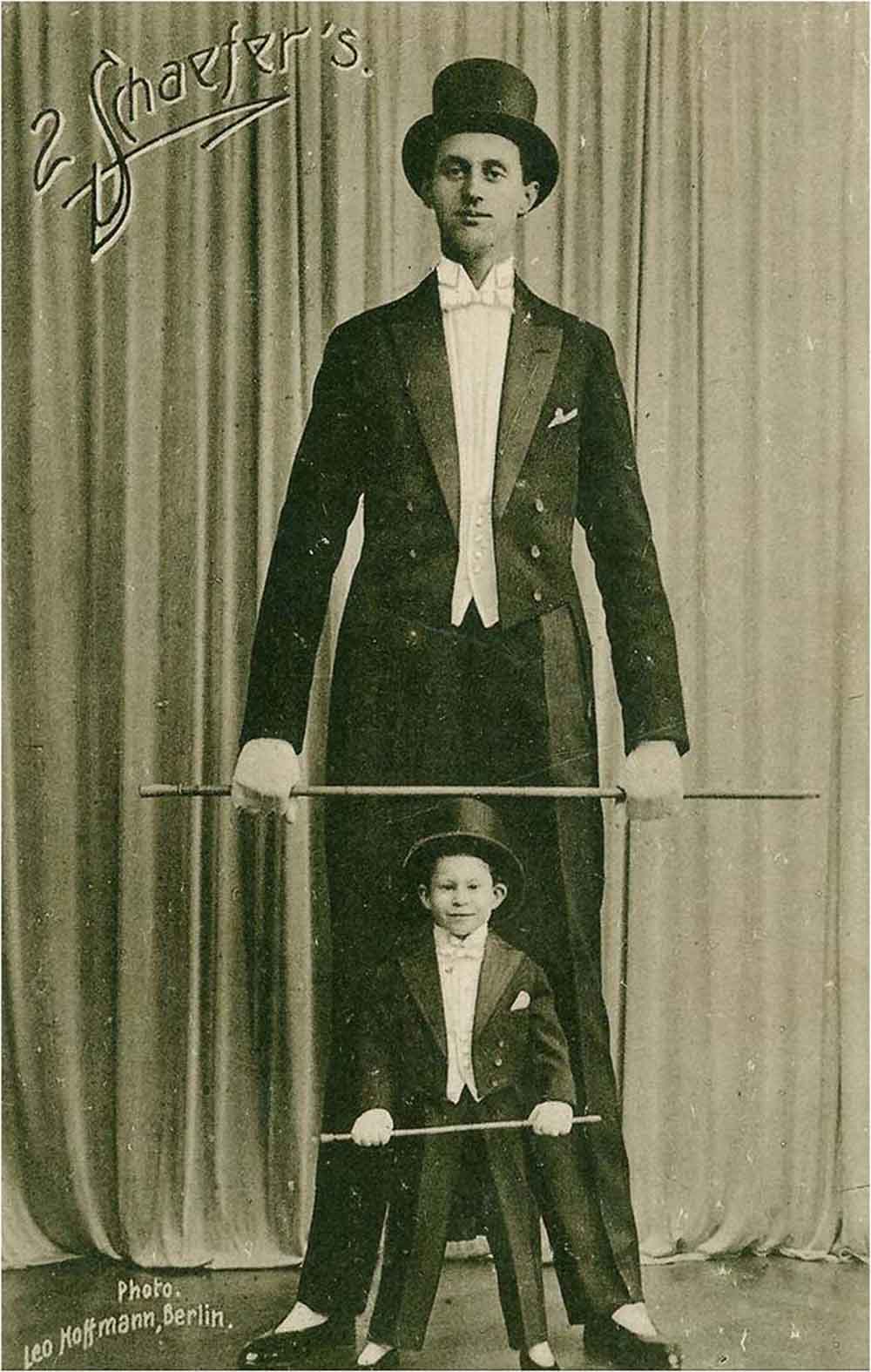 Nacken 17 as circus acrobat with a young boy assistant.