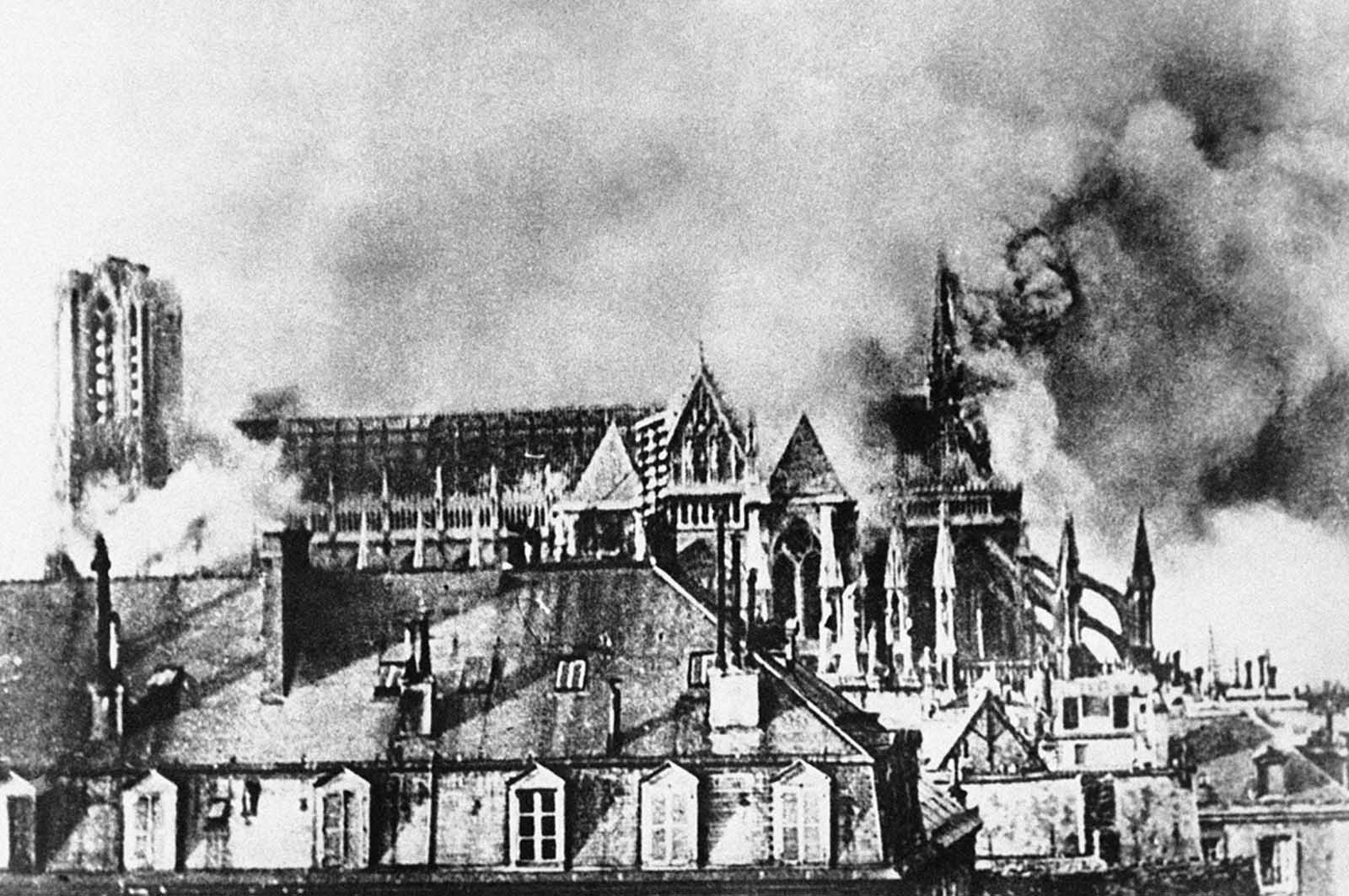 Bombardment of the Cathedral of Reims, France, in September of 1914, as German incendiary bombs fell on the towers and on the apse during the German invasion of northern France.