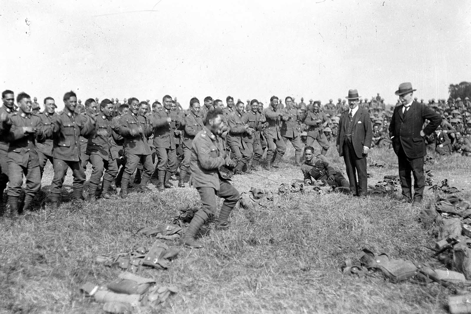 Members of New Zealand's Maori Pioneer Battalion perform a haka for New Zealand's Prime Minister William Massey and Deputy Prime Minister Sir Joseph Ward in Bois-de Warnimont, France, during World War I, on June 30, 1918.
