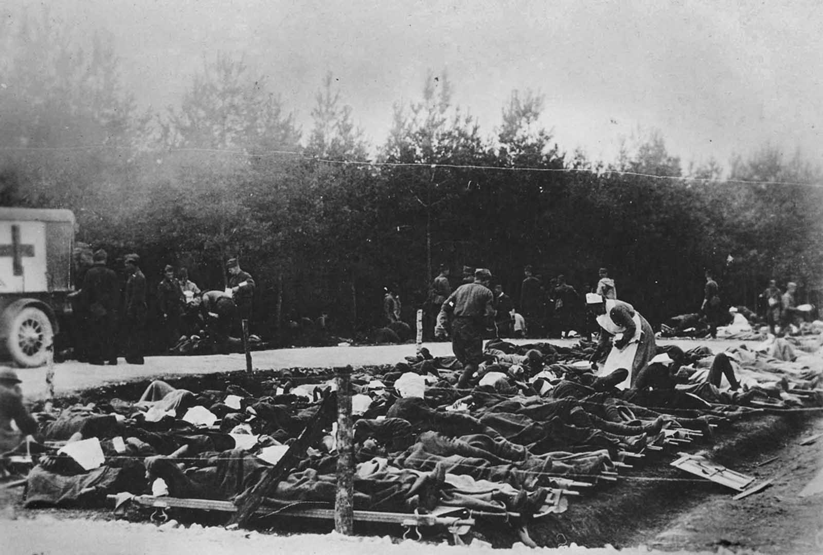 Gassed patients are treated at the 326th Field Hospital near Royaumeix, France, on August 8, 1918. The hospital was not large enough to accommodate the large number of patients.