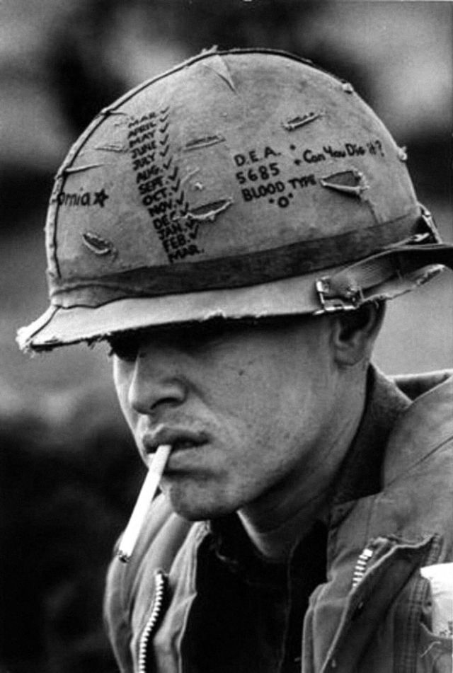 Graffiti on Soldiers Helmets Vietnam War