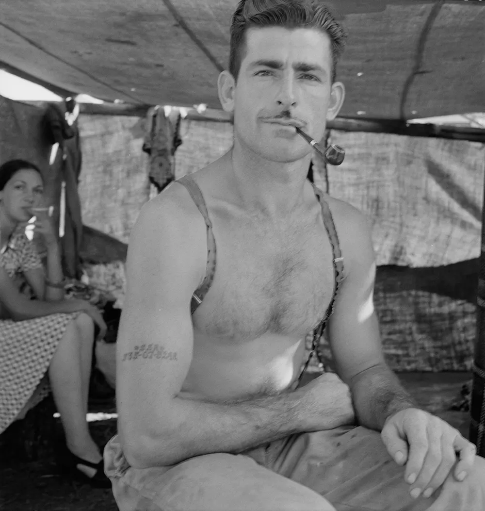 The Iconic Unemployed Worker with a Social Security Tattoo: The Story Behind One of the Most Striking Photos of the Great Depression