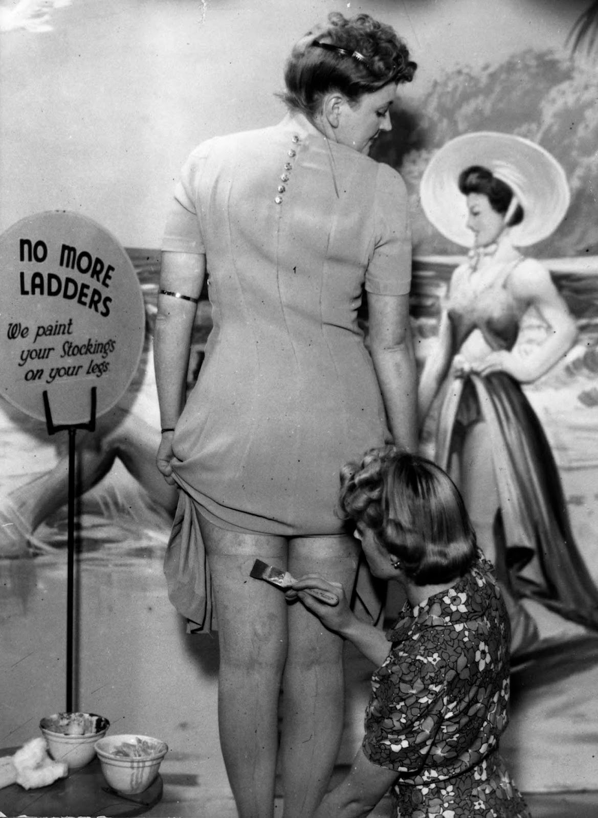 During stocking rationing, a beautician at the newly opened Bare Leg Beauty Bar at Kennard's store in Croydon, England, paints stockings onto a customer's skin.