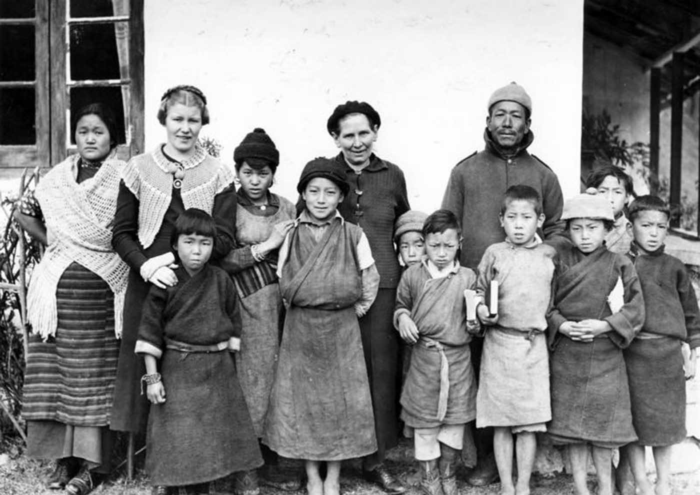 Mission school in Lachen, a Finnish missionary with her assistant and a native pastor.