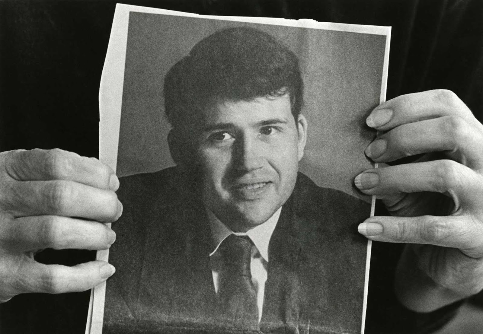 His sister shows a picture of young David Kirby.