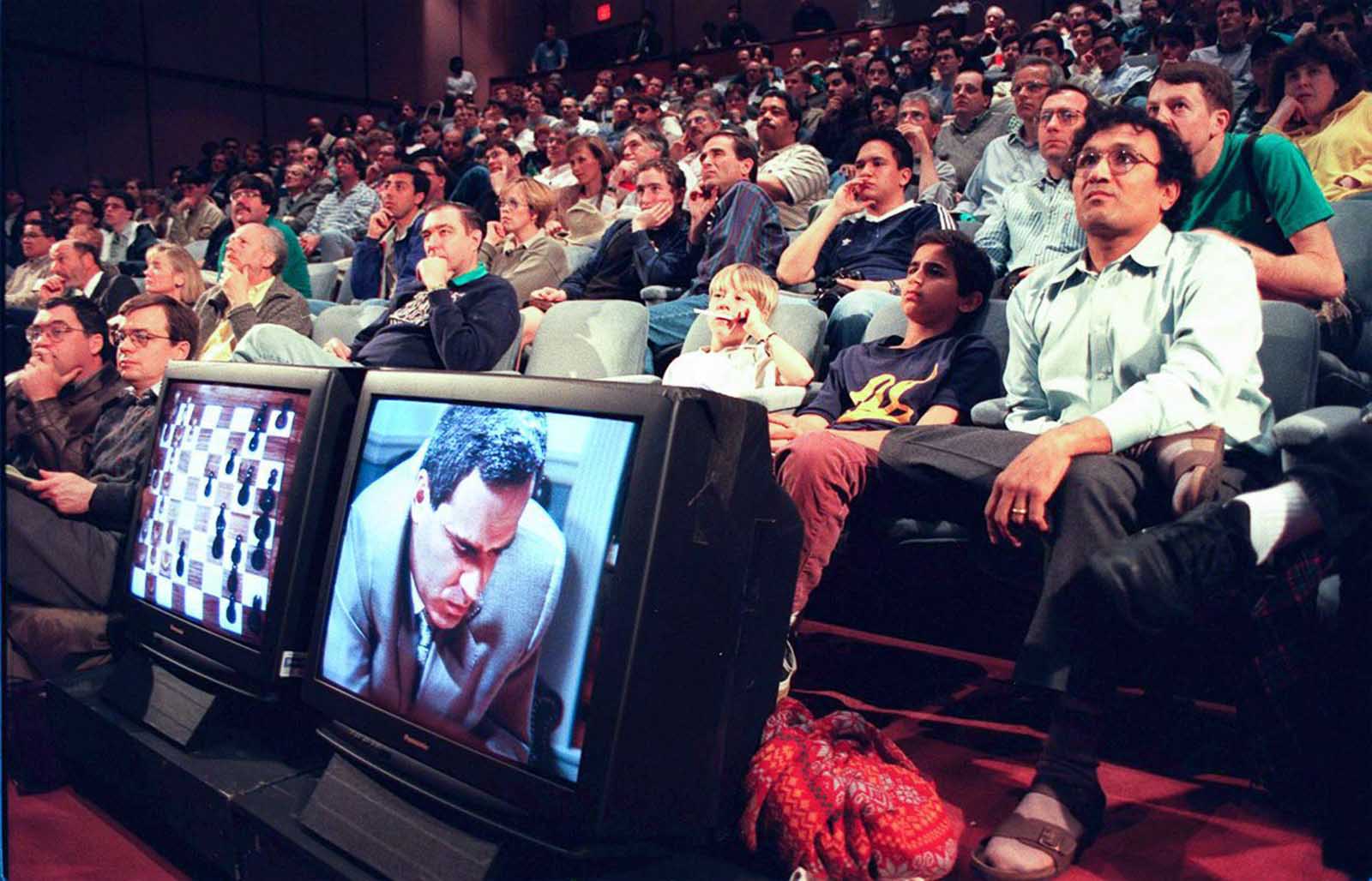 Spectators watch the first game. March 3, 1997.