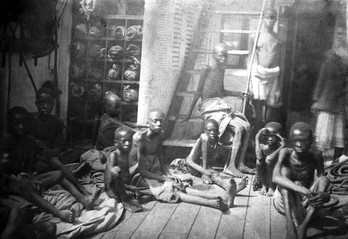 Rescued slaves crowd the deck of the HMS Daphne, 1868