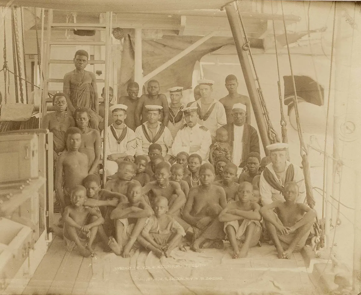 Rescued slaves crowd the deck of the HMS Daphne, 1868