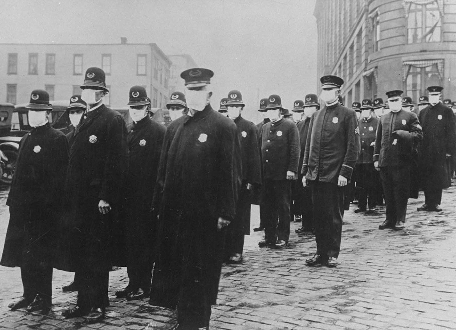 Seattle policemen wear protective gauze face masks during the influenza epidemic. 1918.