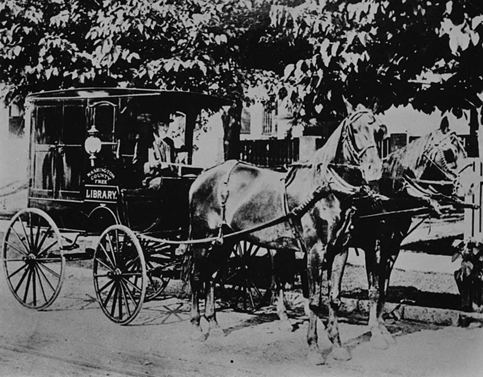 One of the earliest book wagons in the United States, the Washington County Free Library, Maryland, c. 1905.
