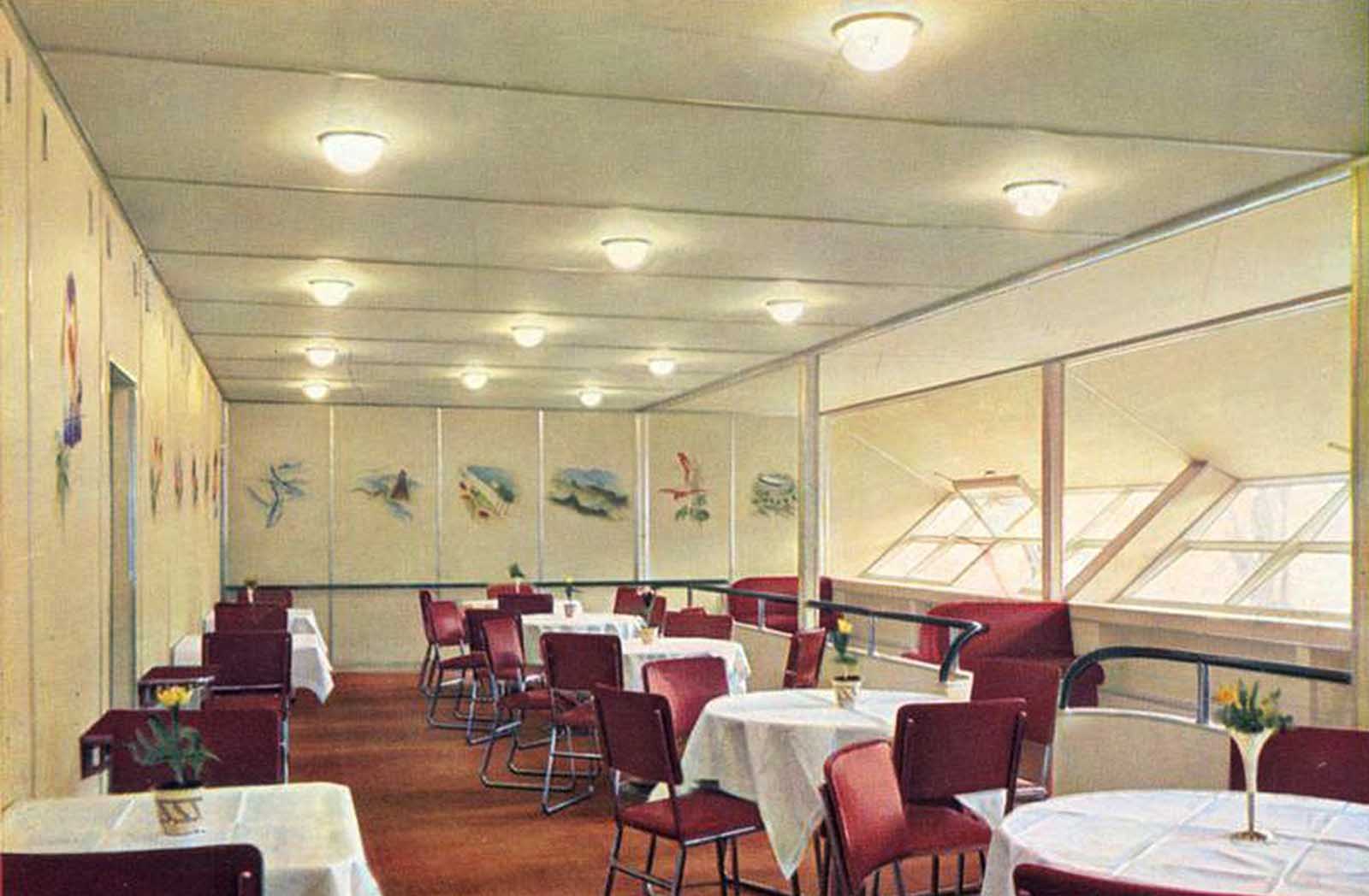A color photograph of the dining room aboard the Hindenburg.