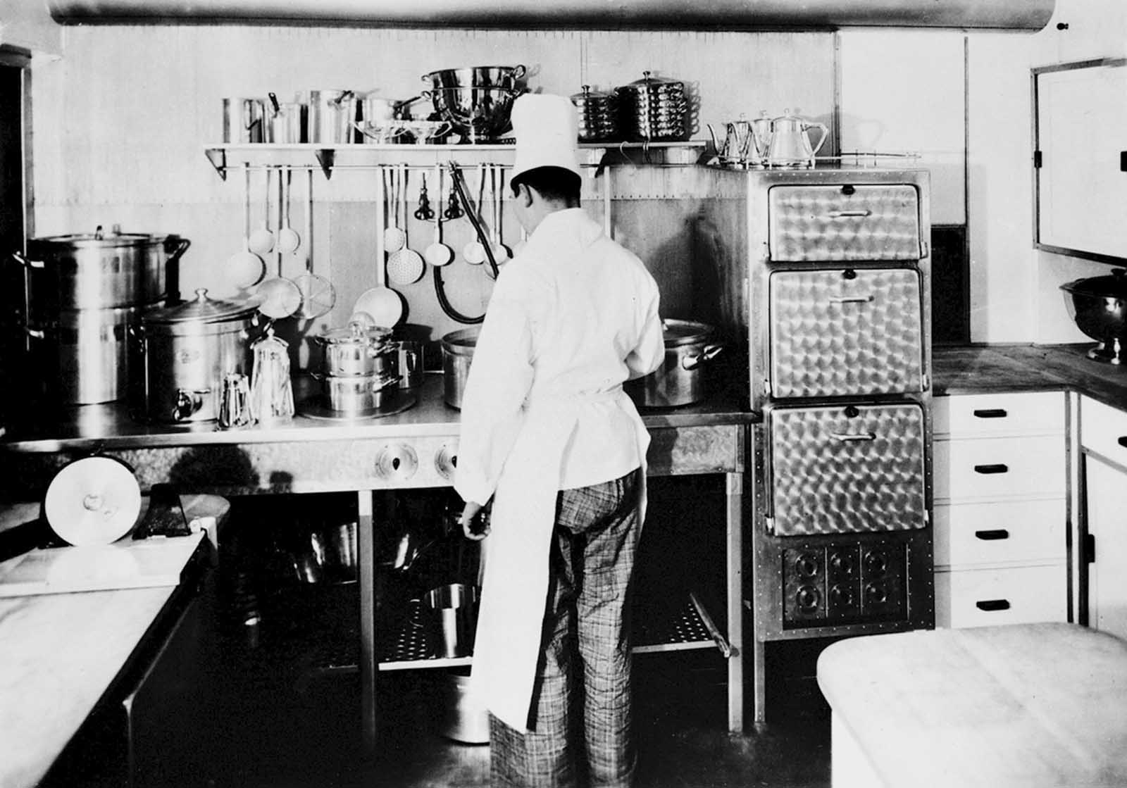 A modern, electrically equipped kitchen aboard the Hindenburg provided for the passengers and crew, seen in this undated photograph.