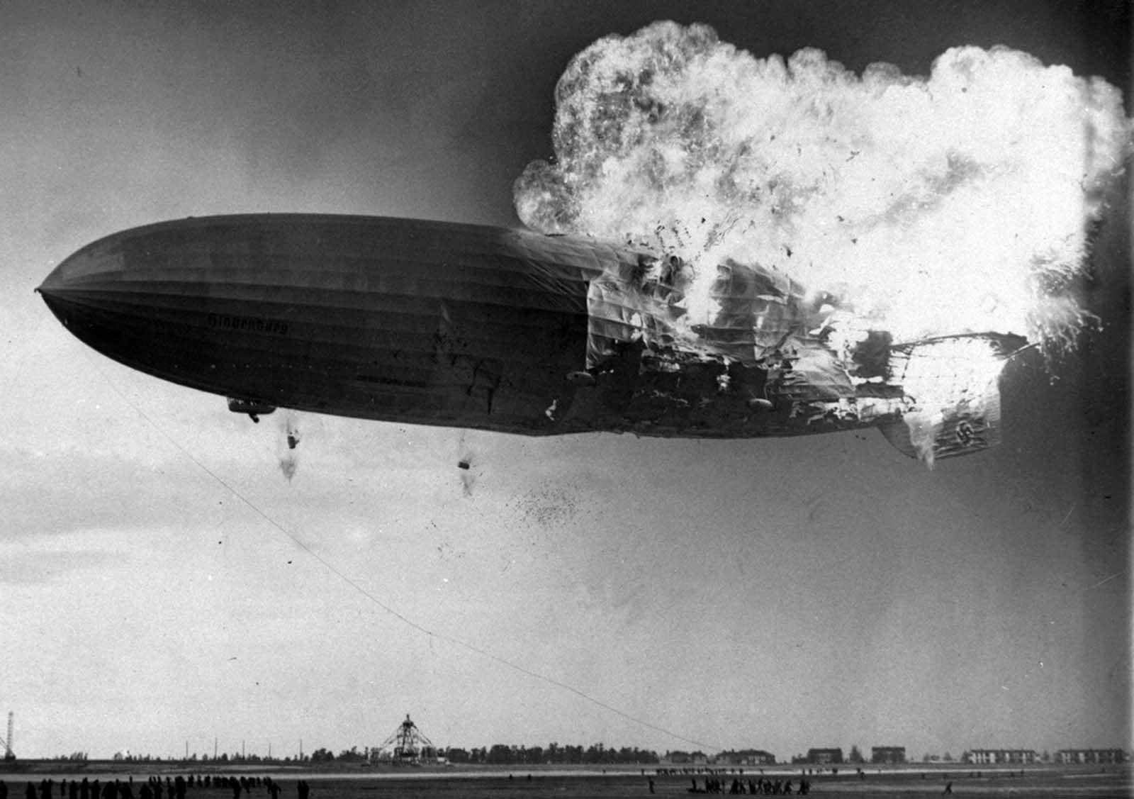 At approximately 7:25 p.m. local time, the German zeppelin Hindenburg burst into flames as it nosed toward the mooring post at the Naval Air Station in Lakehurst, New Jersey, on May 6, 1937. The airship was still some 200 feet above the ground.