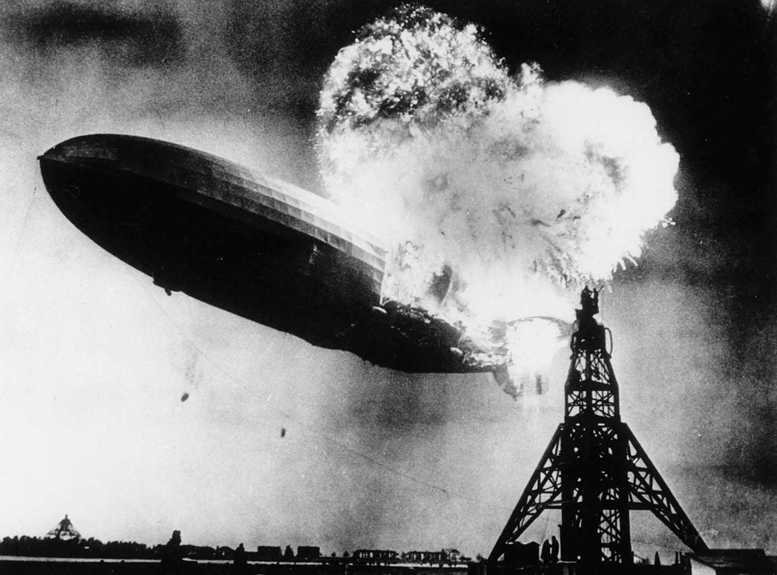 The Hindenburg quickly went up in flames -- less than a minute passed between the first signs of trouble and complete disaster. This image captures a moment between the second and third explosions before the airship hit the ground.